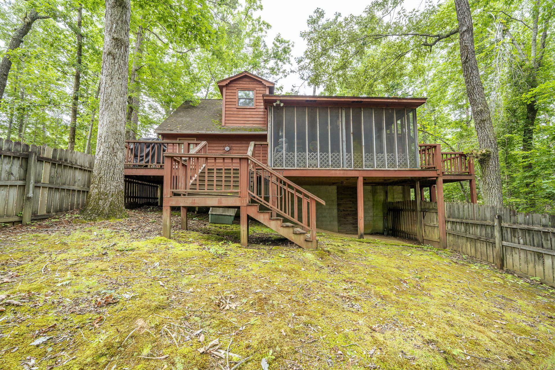 405 Murray Lane Counce, TN 38326 - Photo 3 of 36 a backyard of a house with table and chairs
