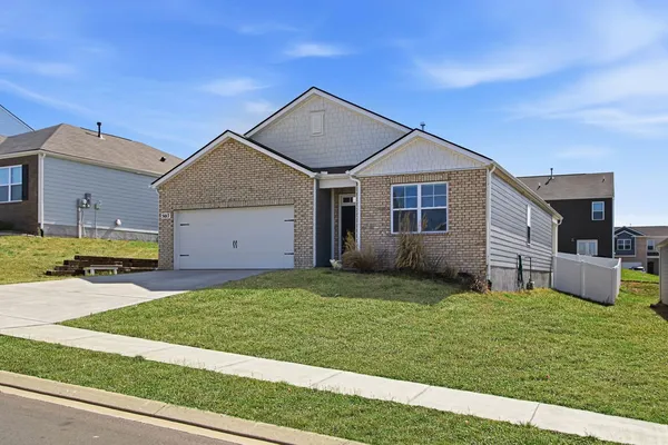 a house view with a garden space
