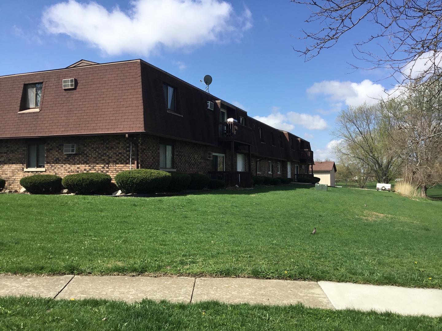 1115 Shagbark Road, Unit 2B New Lenox, IL 60451 - Photo 1 of 19 a view of house with backyard