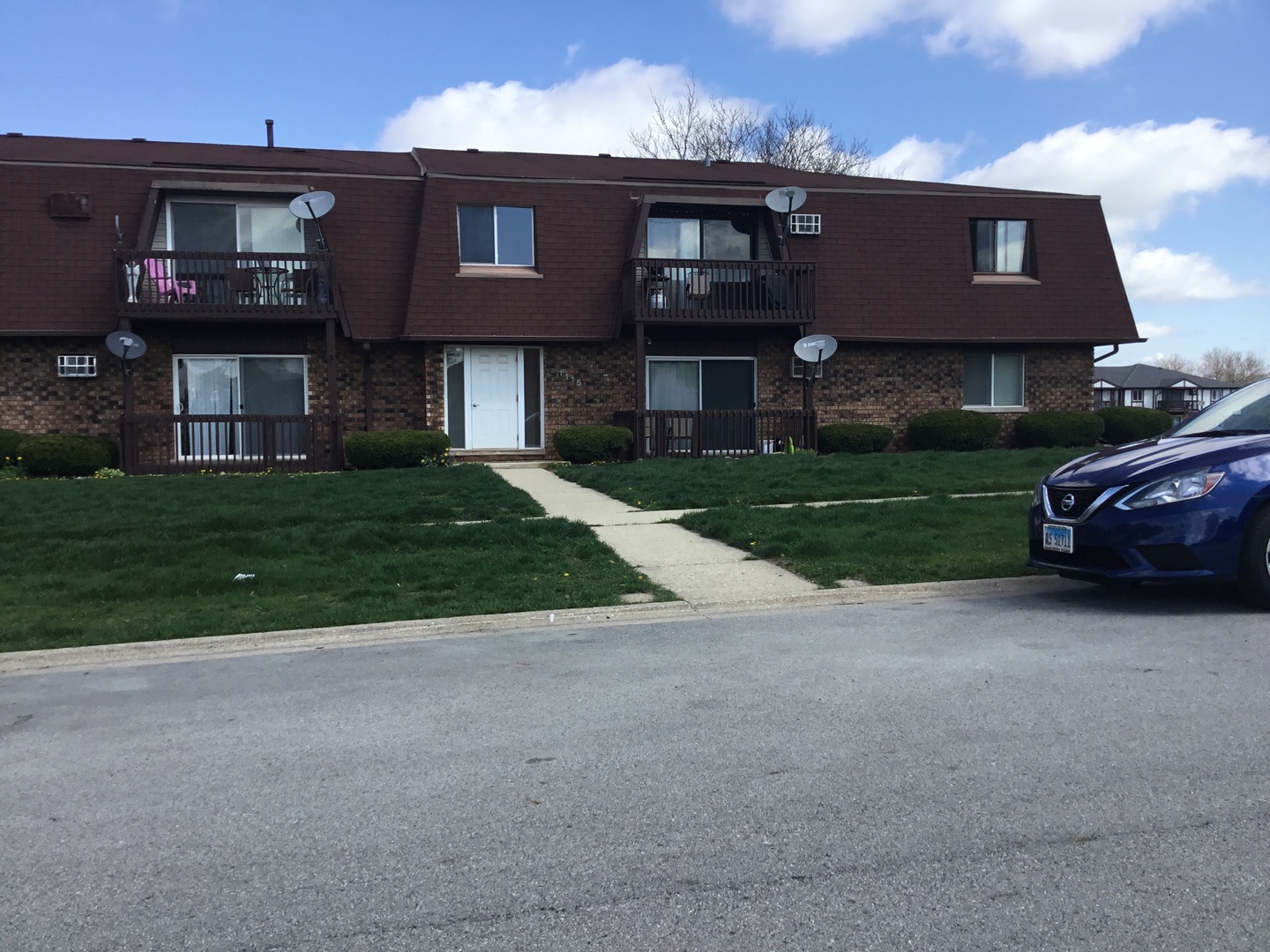 1115 Shagbark Road, Unit 2B New Lenox, IL 60451 - Photo 19 of 19 a view of a yard in front of a house