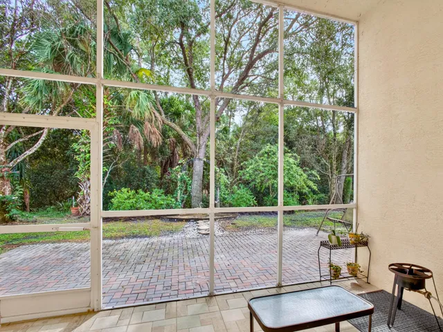 a view of a pathway with a yard