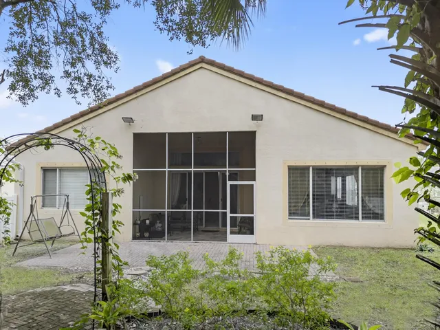 a view of a house with a garden