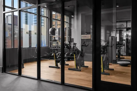 a view of a room with gym equipment