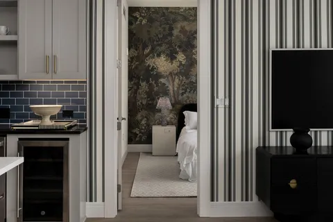 a kitchen with a refrigerator and a stove