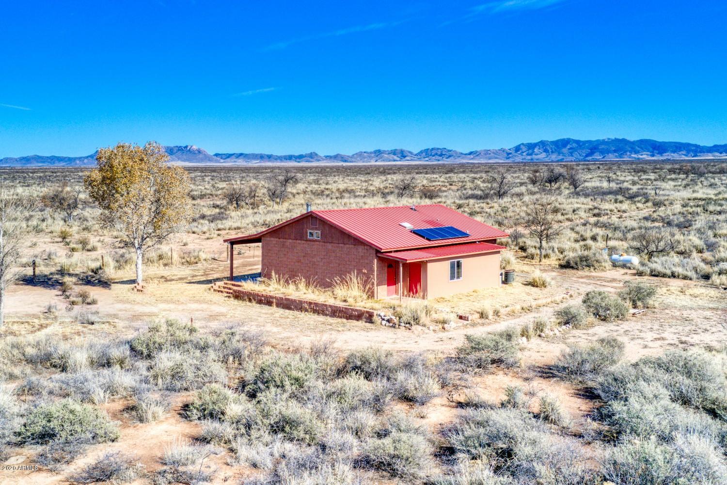 11500 South Duck Tank Road Pearce, AZ 85625 - Photo 3 of 38 a view of a sky from a yard