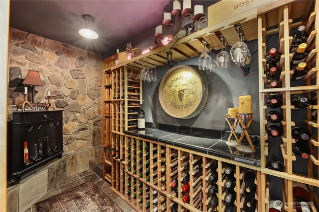 a bedroom with two beds and a flat screen tv