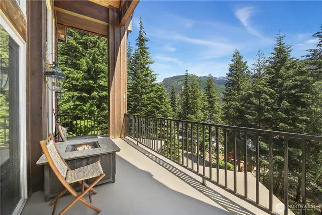 a view of a balcony with chairs