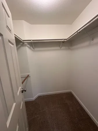 a view of a room with racks on the wall