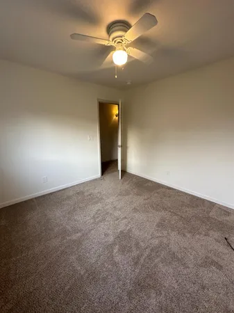 a view of a room with racks on the wall