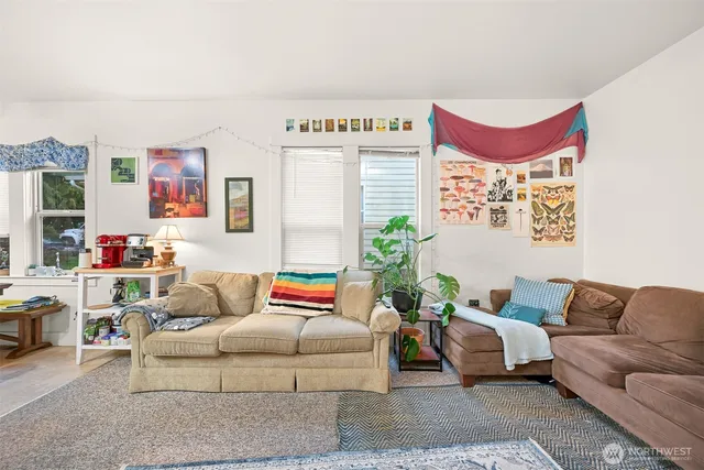 a living room with furniture and a couch