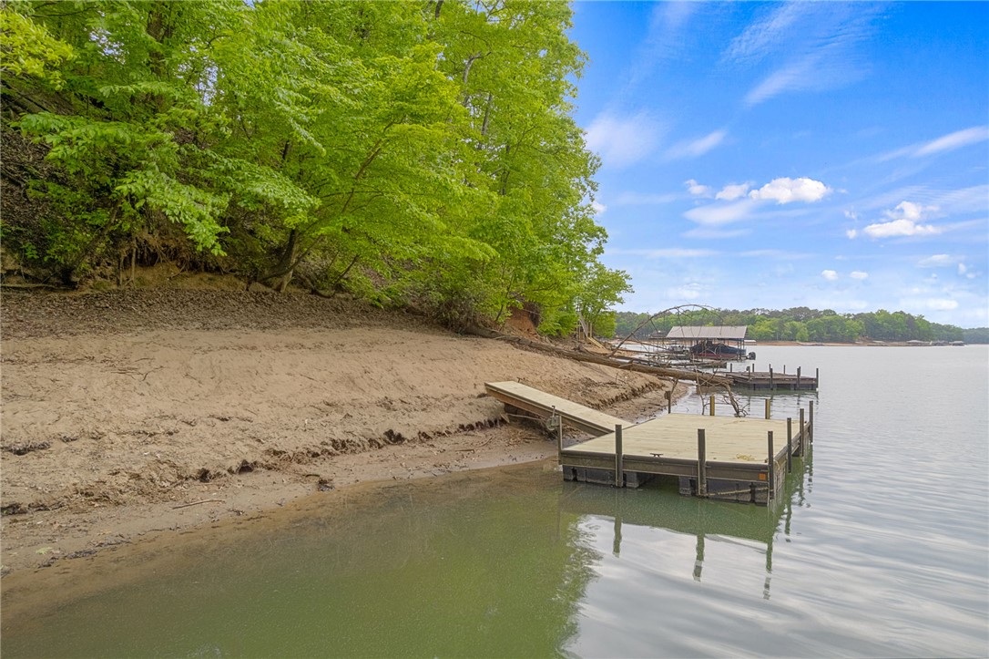 5 Shelor Ferry Road Fair Play, SC 29643 - Photo 1 of 17 Private dock located in a protected Lake Hartwell cove with water still surrounding the dock, even with current low lake levels.