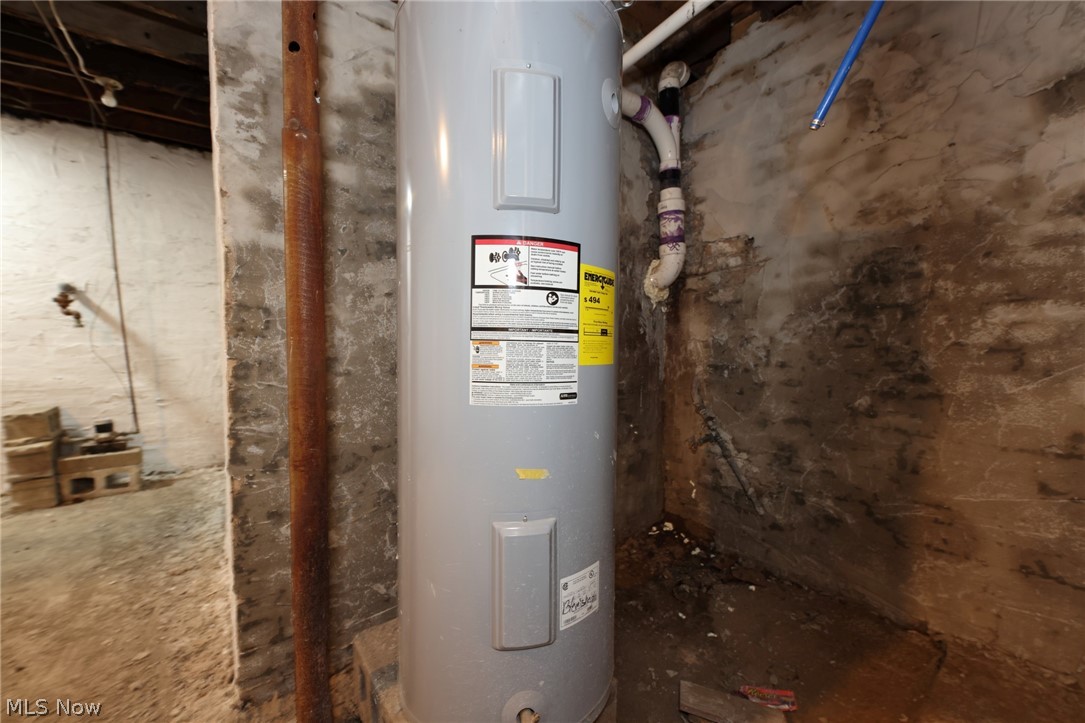 416 5th Street Chester, WV 26034 - Photo 22 of 24 Freestanding water heater with visible utility connections