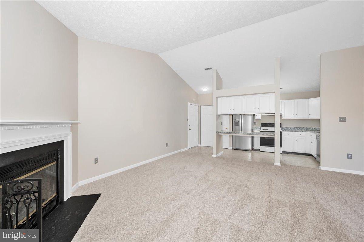 2129 Wainwright Court, Unit 2D Frederick, MD 21702 - Photo 17 of 57 Spacious living area with vaulted ceilings.