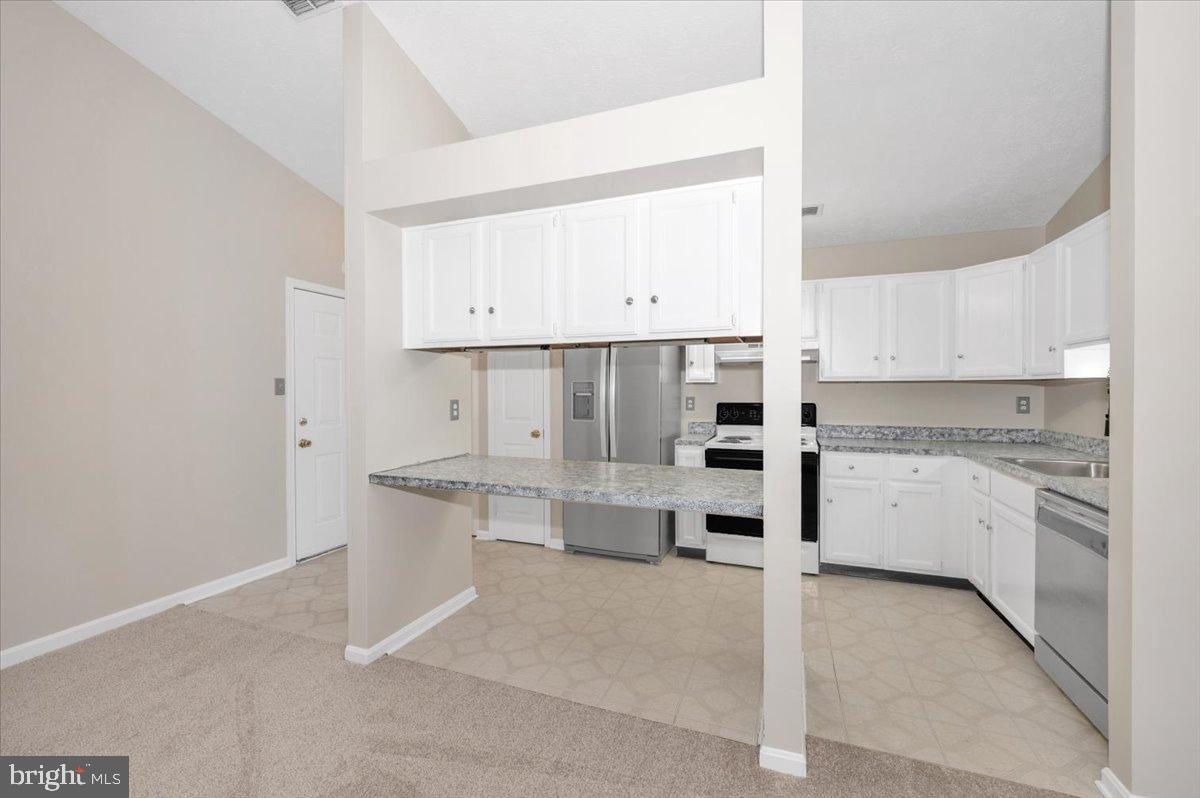 2129 Wainwright Court, Unit 2D Frederick, MD 21702 - Photo 23 of 57 Modern kitchen with open layout charm.
