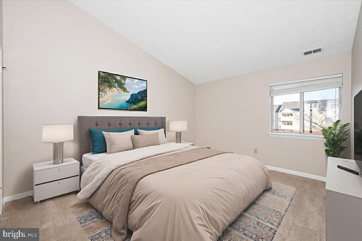 2129 Wainwright Court, Unit 2D Frederick, MD 21702 - Photo 4 of 57 Serene bedroom with natural light and views.