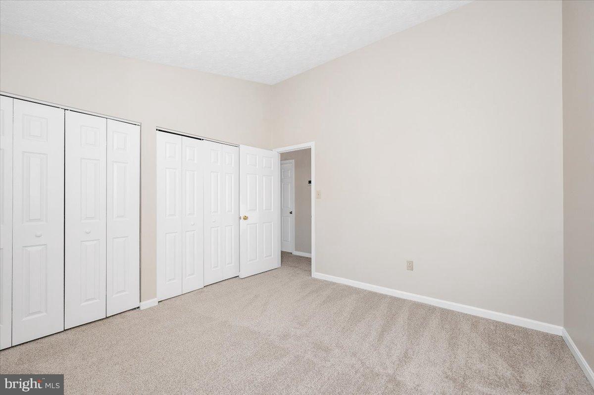 2129 Wainwright Court, Unit 2D Frederick, MD 21702 - Photo 45 of 57 Spacious room with ample storage options.