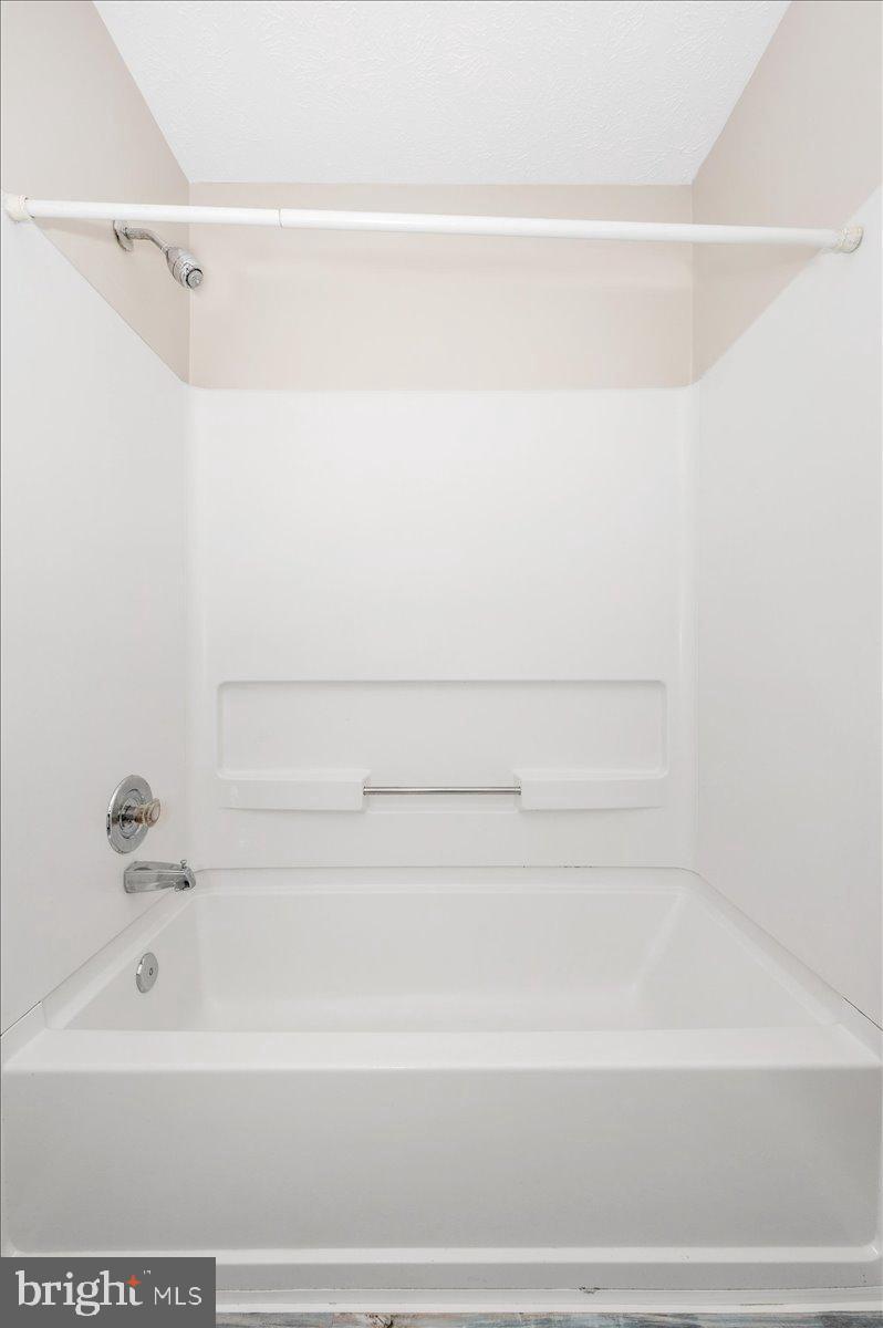 2129 Wainwright Court, Unit 2D Frederick, MD 21702 - Photo 47 of 57 Modern, clean bathtub for relaxation.