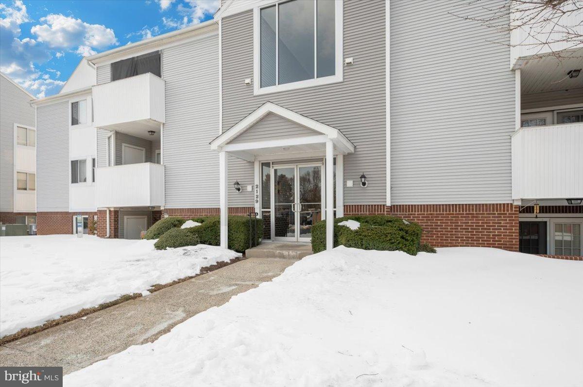 2129 Wainwright Court, Unit 2D Frederick, MD 21702 - Photo 51 of 57 Charming entrance in a winter wonderland.