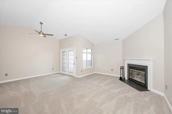 a view of kitchen and fireplace