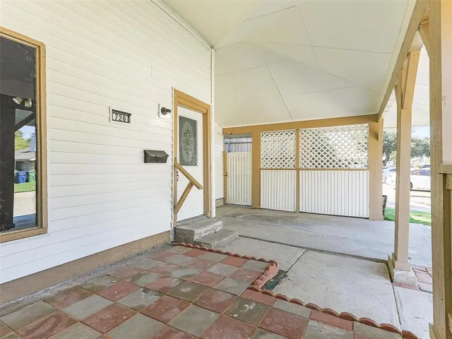 a view of a room with a large window