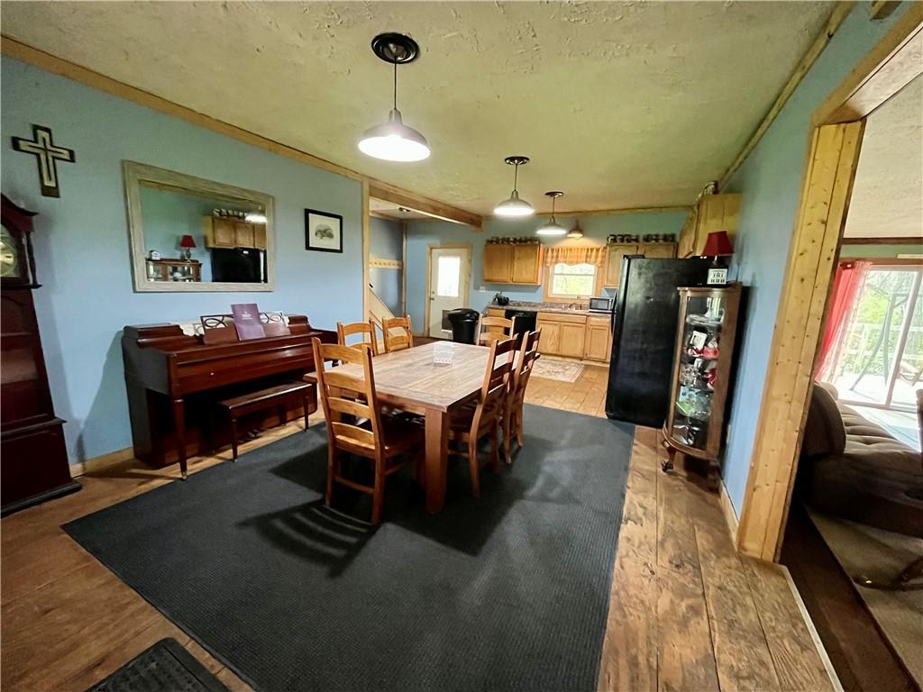 2513 Old Rte 18 Wampum, PA 16157 - Photo 7 of 38 Front door entry/Dining room/Kitchen
