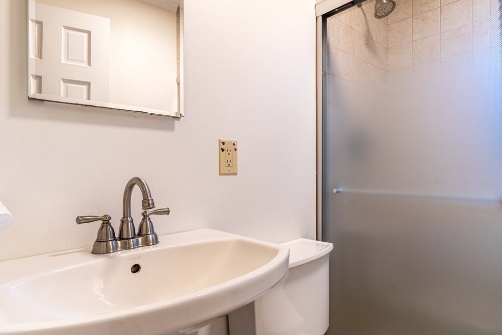 36 Sylvester Road Natick, MA 01760 - Photo 17 of 30 a bathroom with a sink and mirror