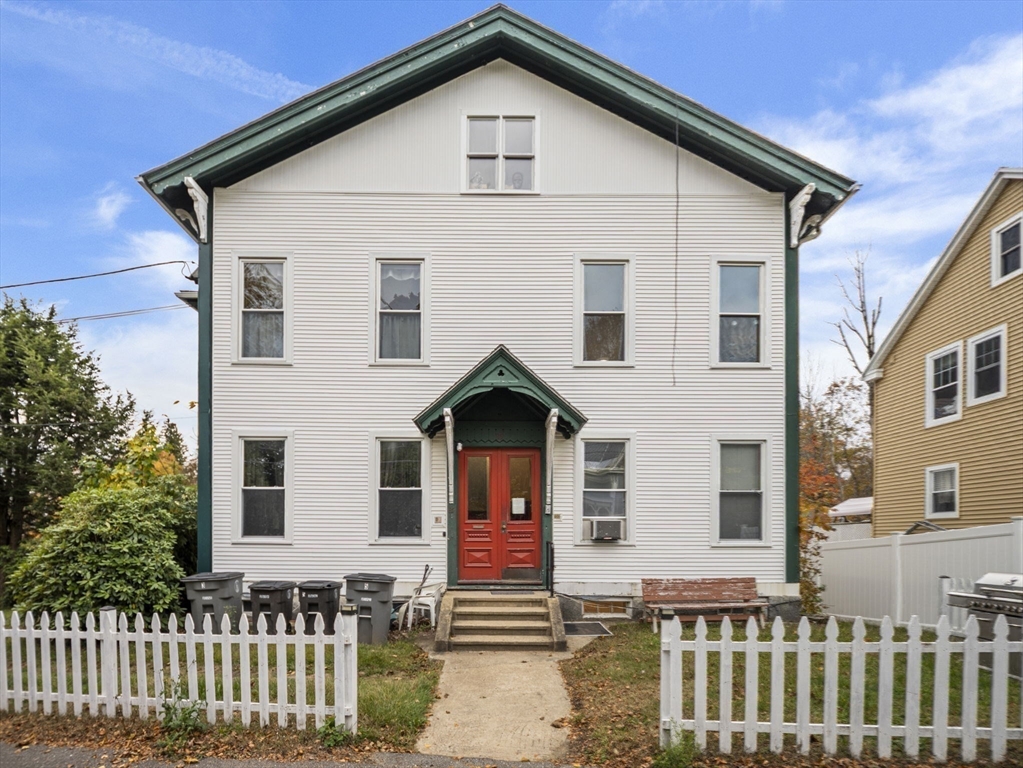 35 Cedar Street, Unit 6 Gardner, MA 01440 - Photo 31 of 33 a front view of a house with a yard