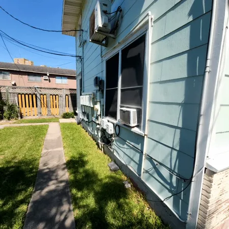 a view of swimming pool with a yard