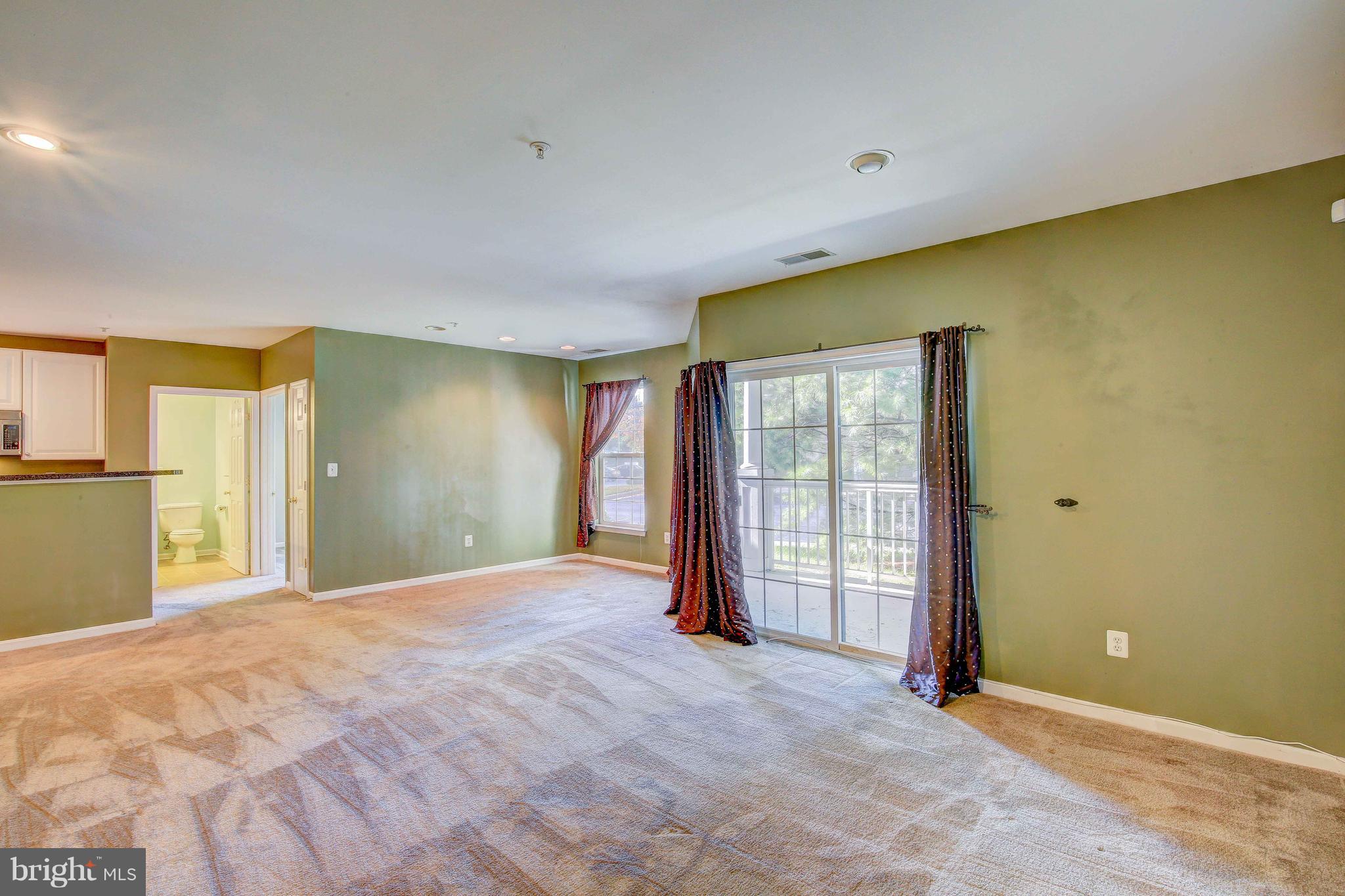 32 Hawk Rise Lane, Unit 102 Owings Mills, MD 21117 - Photo 6 of 34 Side View of Living Room