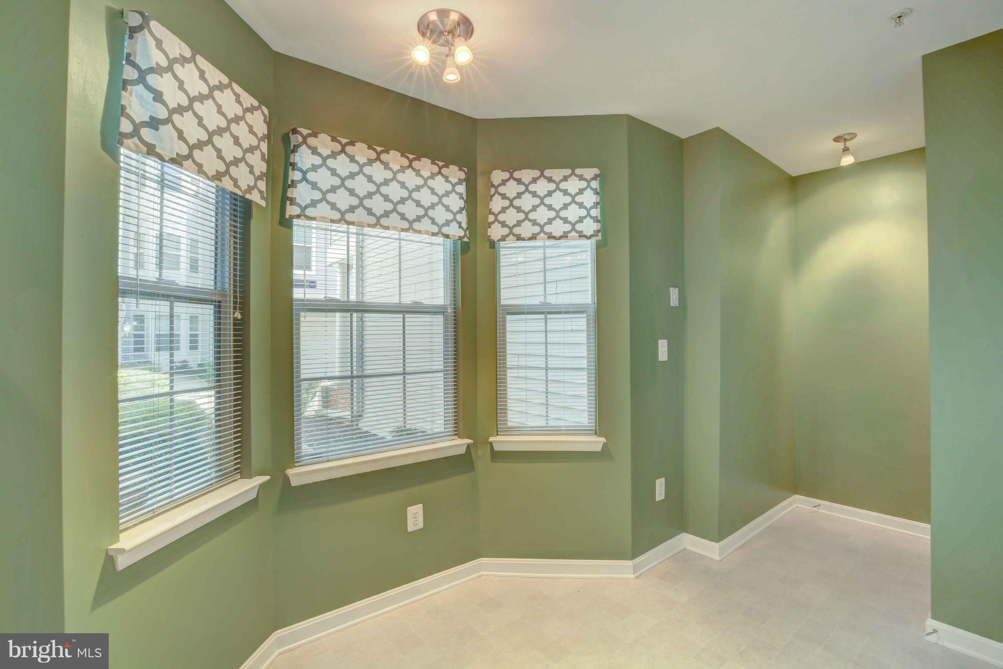 32 Hawk Rise Lane, Unit 102 Owings Mills, MD 21117 - Photo 9 of 34 Windows and Sunlight- Eating Area