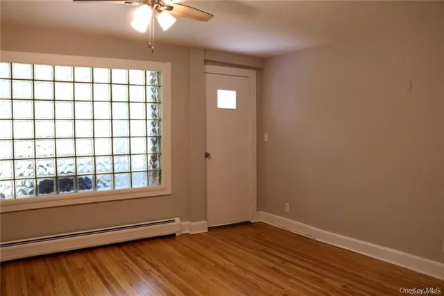a kitchen with granite countertop a stove and a sink