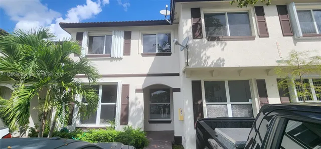 a front view of a house with a porch