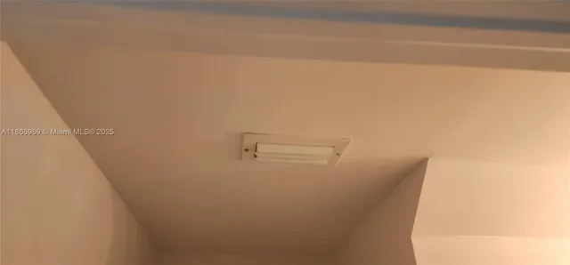 a view of hallway with windows