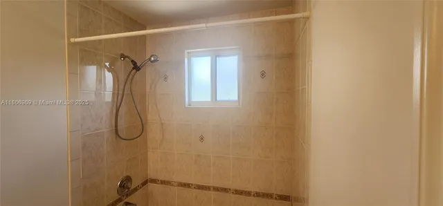 a view of a lake with a yard