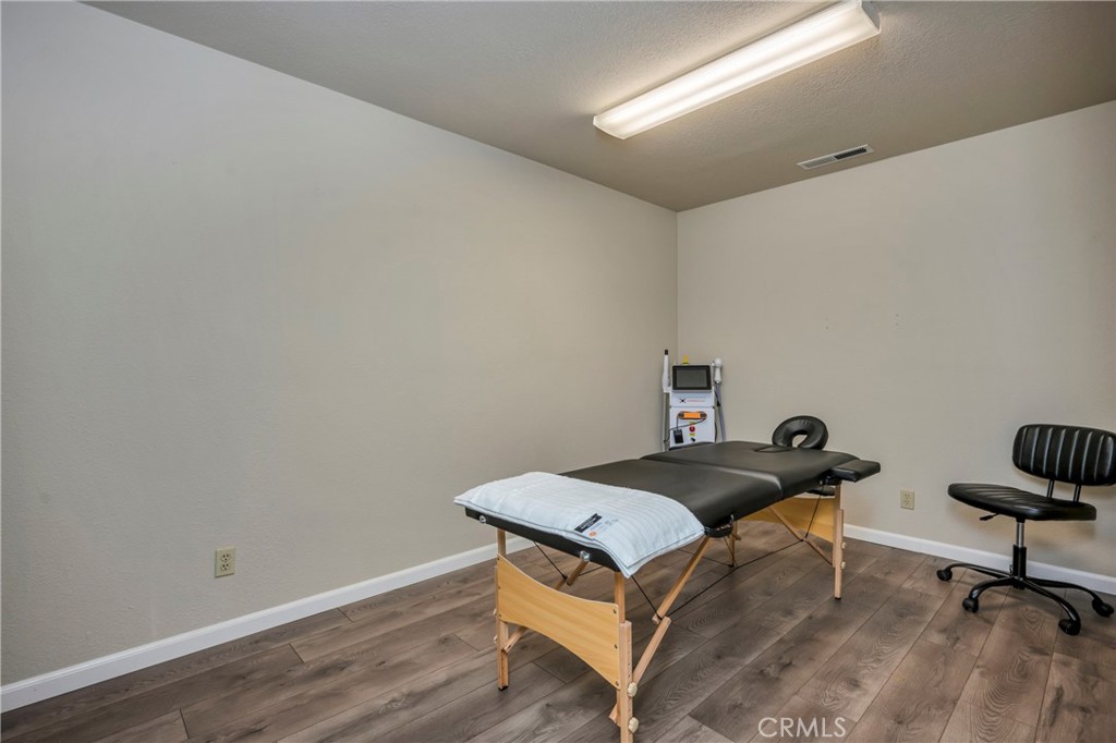 21130 Calistoga Road Middletown, CA 95461 - Photo 20 of 25 a room with a bed and a chair in it