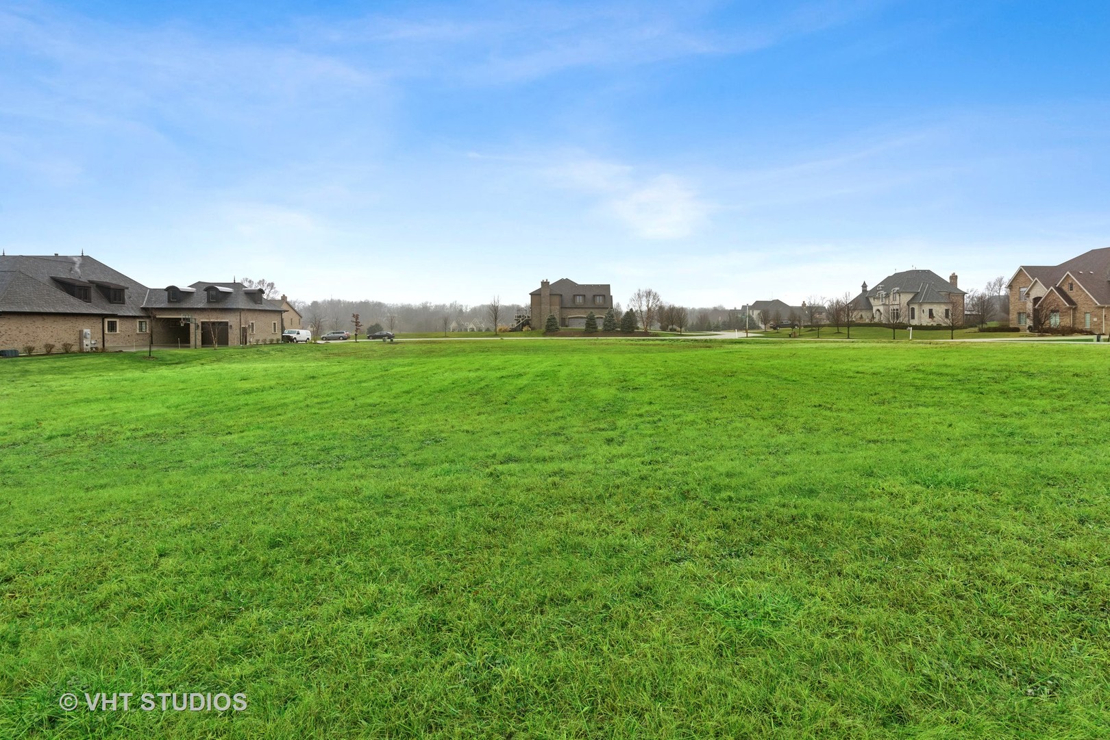 18345 South Pineprairie Drive Mokena, IL 60448 - Photo 6 of 8 a view of a big yard with a house in the background
