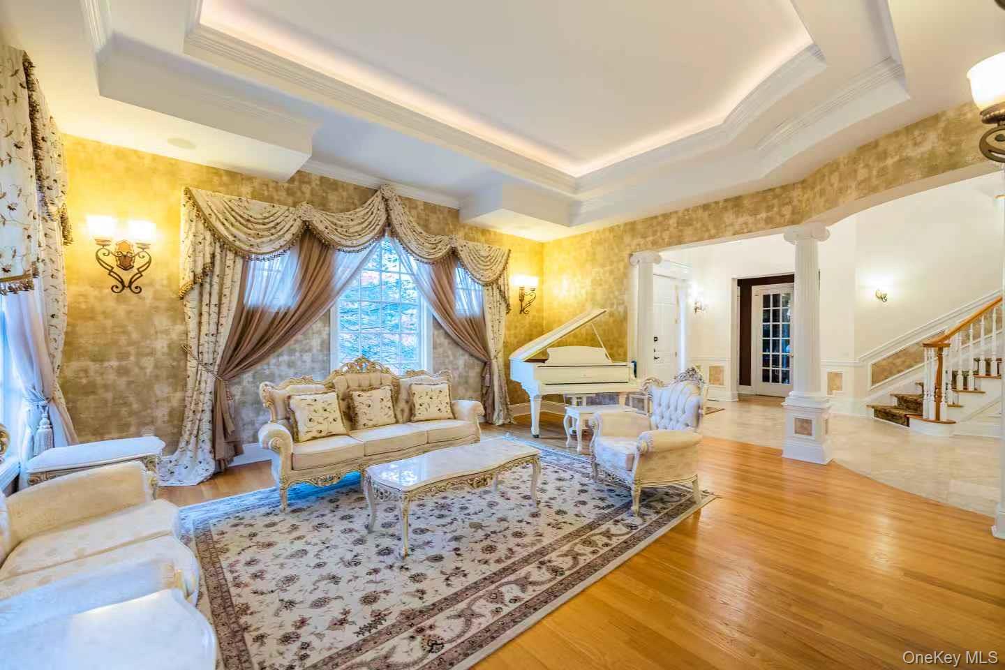 5 Westgate Road Muttontown, NY 11791 - Photo 13 of 42 a living room with furniture and a wooden floor