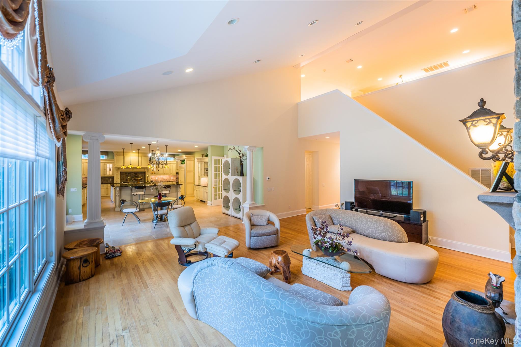 5 Westgate Road Muttontown, NY 11791 - Photo 29 of 42 a living room with furniture and a flat screen tv