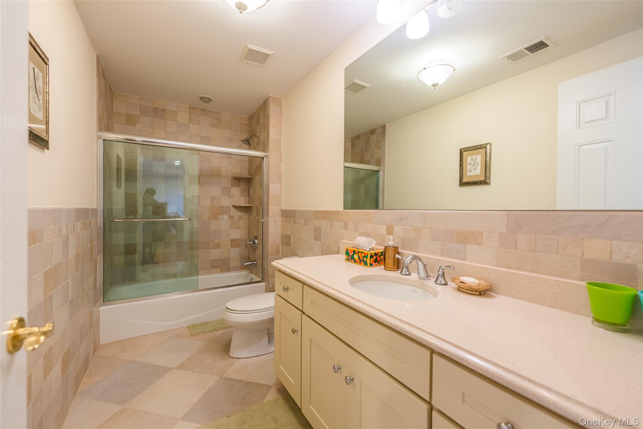5 Westgate Road Muttontown, NY 11791 - Photo 35 of 42 a bathroom with a sink a toilet and shower