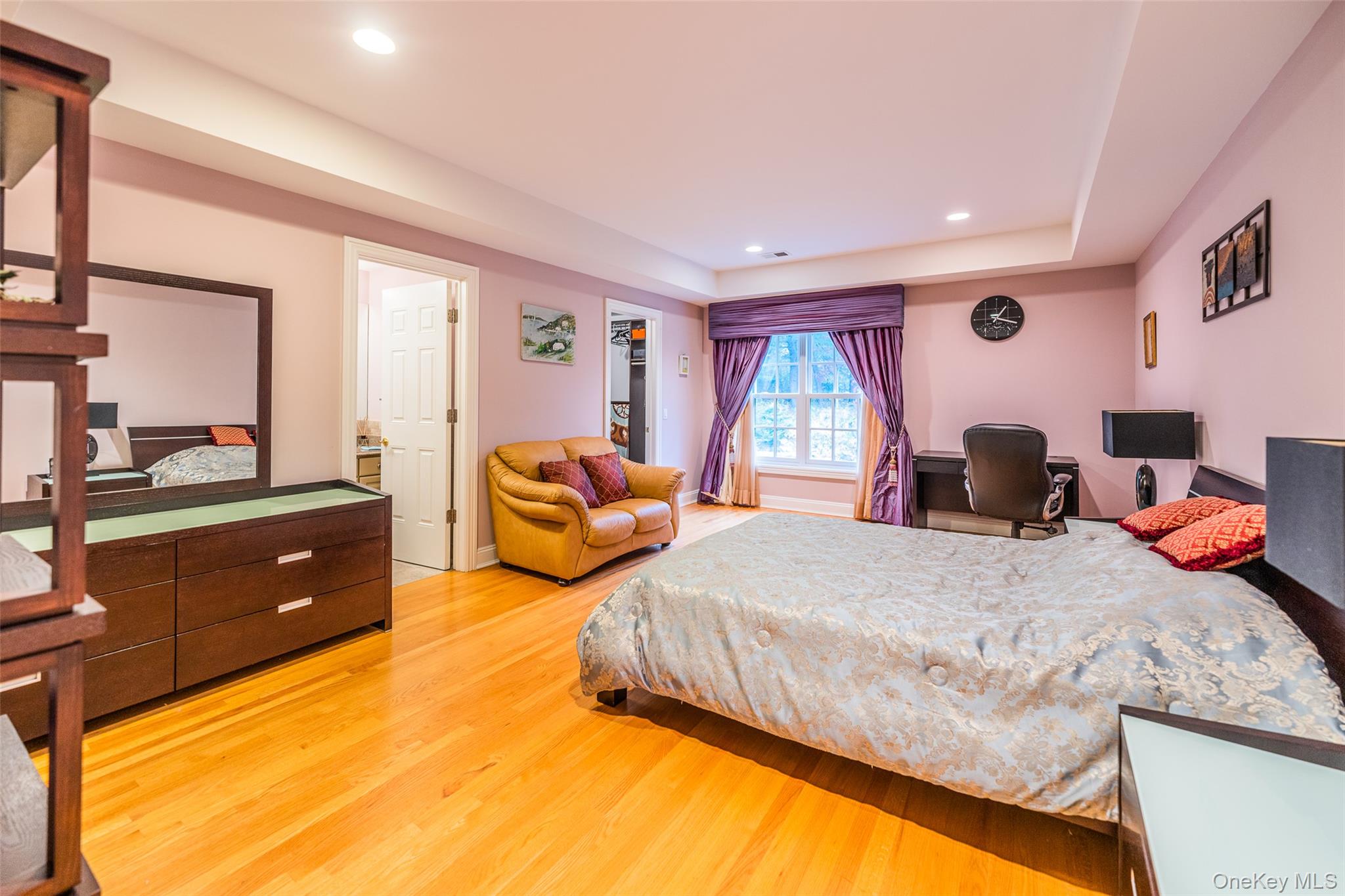 5 Westgate Road Muttontown, NY 11791 - Photo 37 of 42 a bedroom with double bed and a dresser