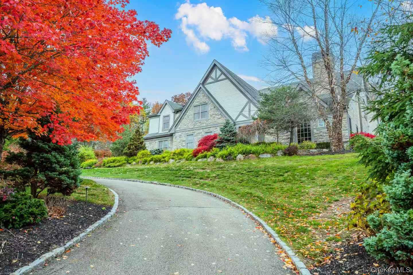 5 Westgate Road Muttontown, NY 11791 - Photo 6 of 42 a front view of house with yard and green space