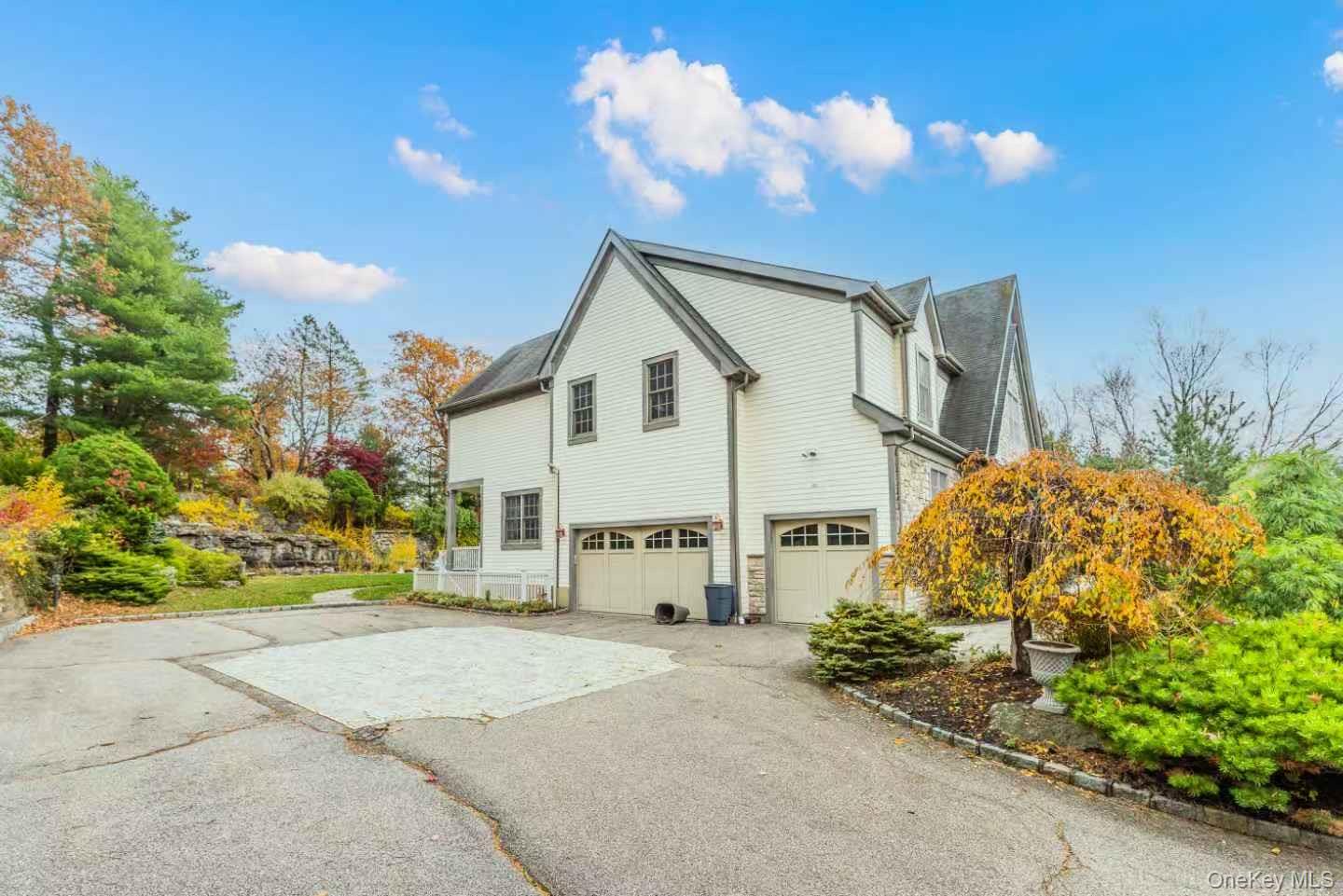 5 Westgate Road Muttontown, NY 11791 - Photo 8 of 42 a view of a house with a backyard
