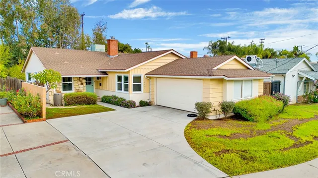 a view of a house with a swimming pool