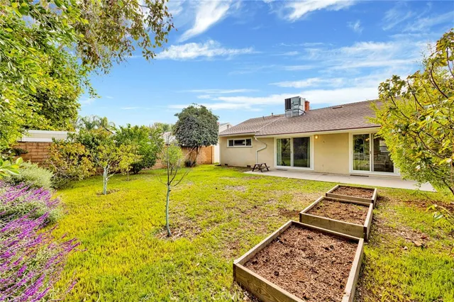 a view of an swimming pool with seating area