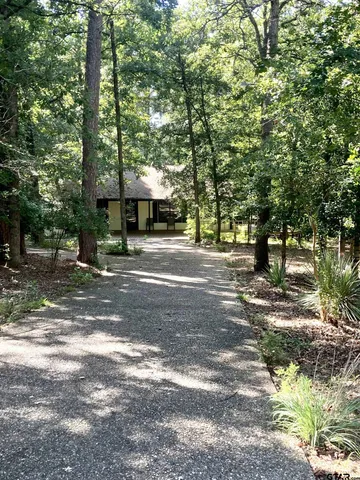 a view of a porch with wooden floor