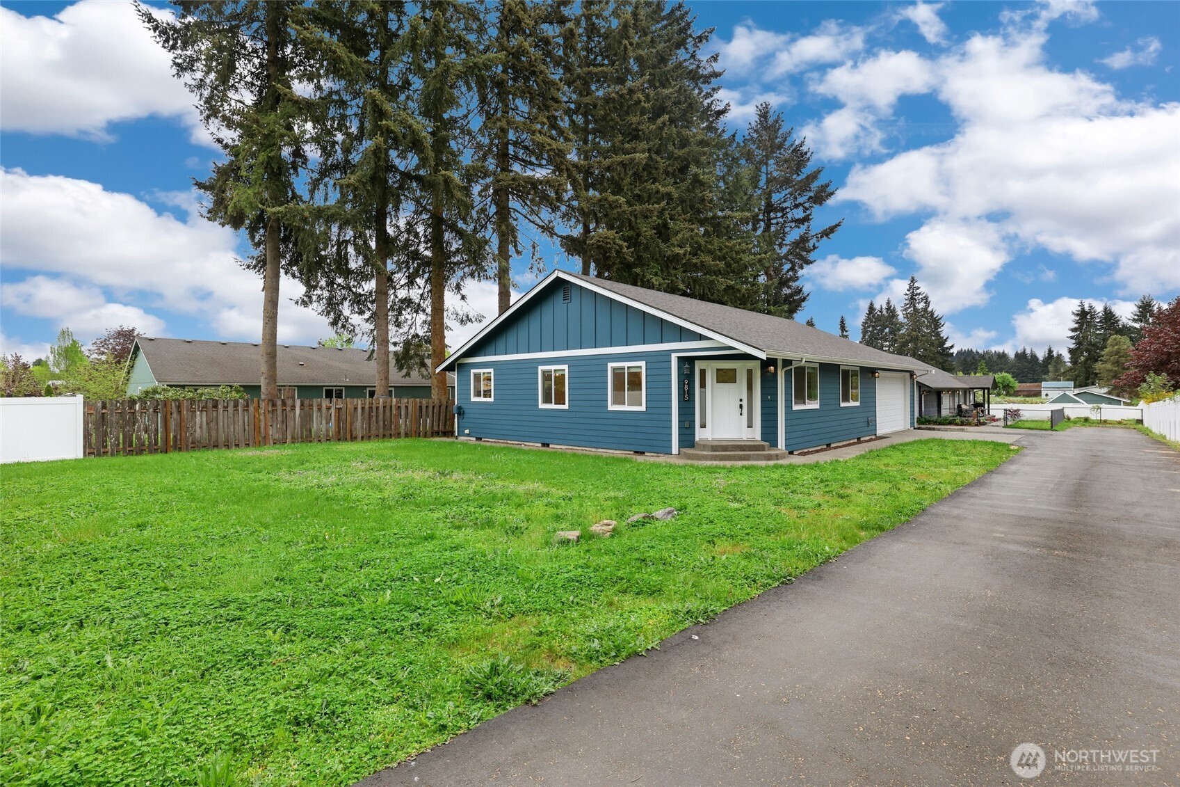 9815 178th Way Southwest Rochester, WA 98579 - Photo 2 of 36 a view of a yard in front of house