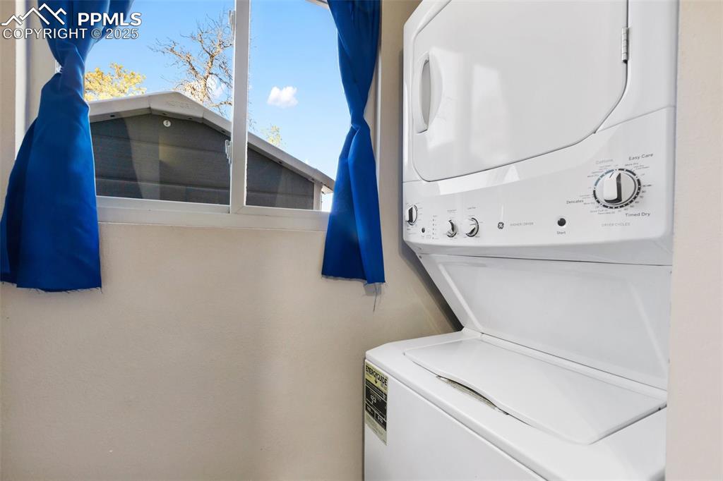 11 Valley Circle Guffey, CO 80820 - Photo 21 of 41 a utility room with dryer and washer