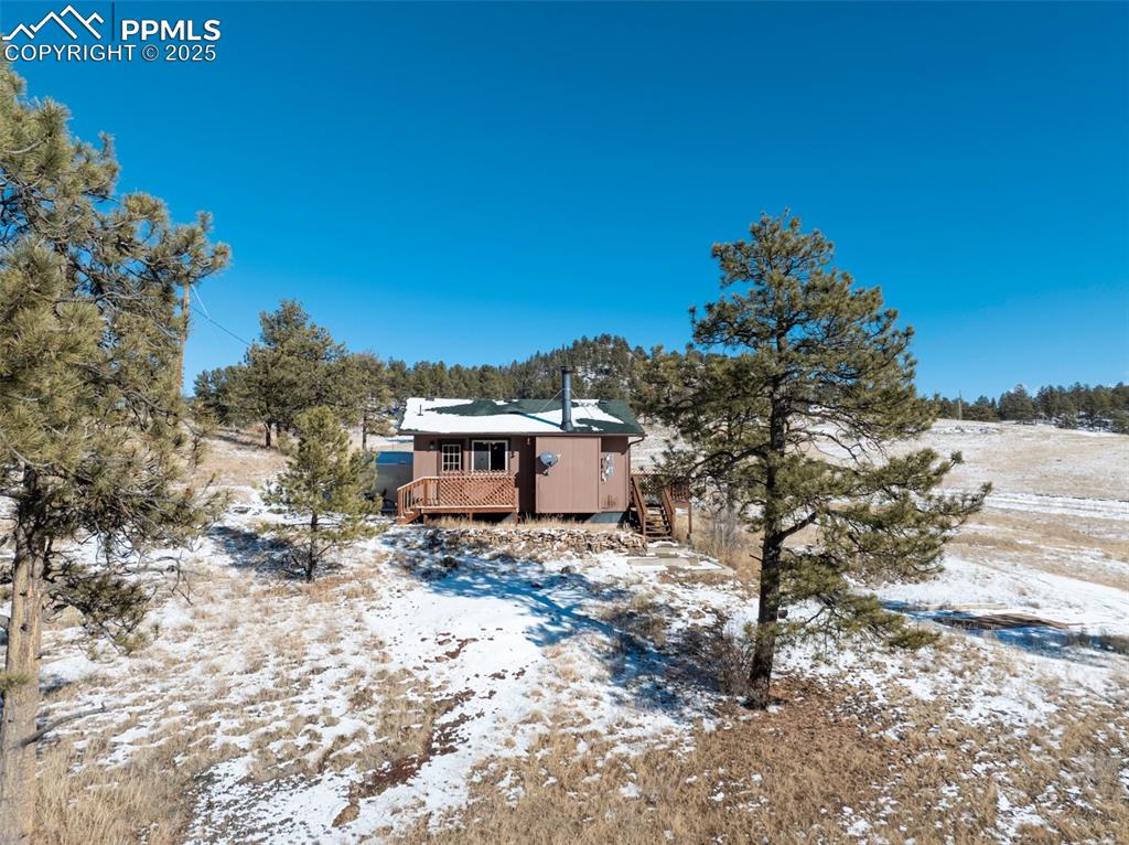 11 Valley Circle Guffey, CO 80820 - Photo 38 of 41 a view of a house with a yard