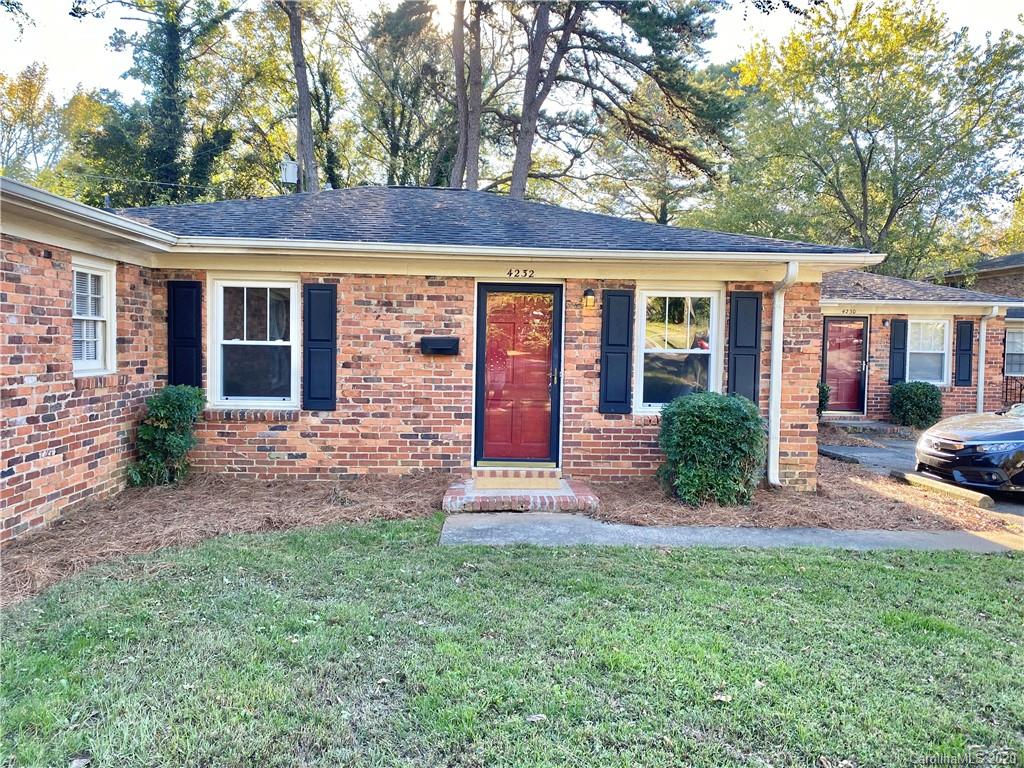 4232 Castleton Road Charlotte, NC 28211 - Photo 15 of 21 front view of a house with a yard