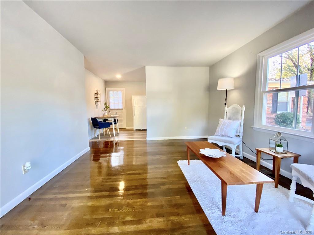 4232 Castleton Road Charlotte, NC 28211 - Photo 6 of 21 a living room with couch and a table